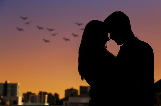 Couple embracing at sunset, symbolising emotional closeness and natural libido support with Ashwagandha.