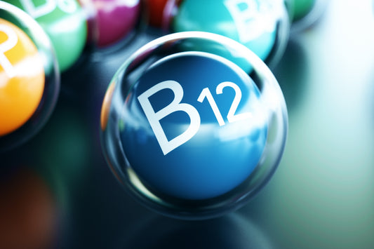 Vitamin B12 molecule representation with a focus on B12 benefits, featuring a blue core labelled B12 surrounded by other spheres.